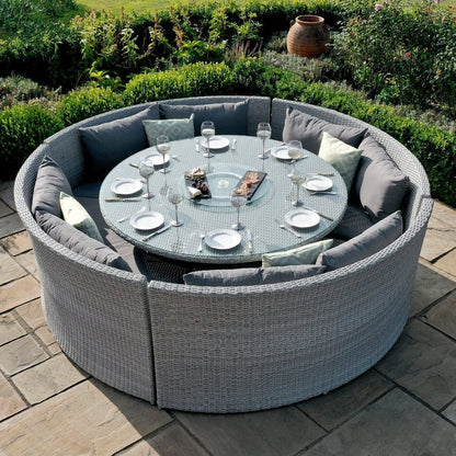 Ensemble de salle à manger avec canapé rond en rotin, table relevable et coussins résistants aux intempéries